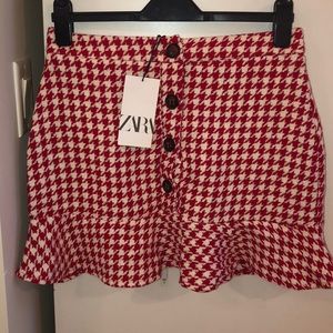 Red skirt. Tag on. Brand new - pristine condition